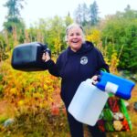 Joella Hogan holding plastic containers